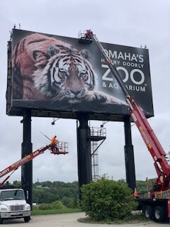 Zoo sign installation with crane