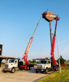 Harley Davidson sign installation with truck