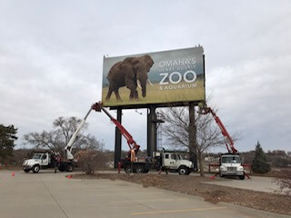 zoo sign being installed